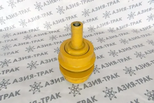 Поддерживающий каток на Komatsu D65A  фото 2