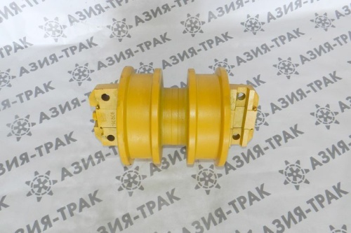 Опорный каток на Komatsu D65A двубортный фото 2