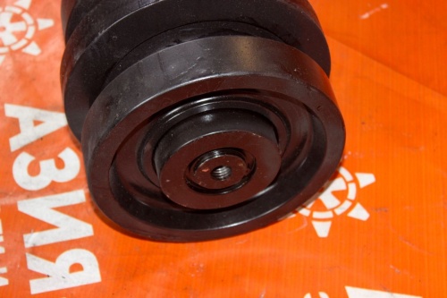 Опорный каток Bobcat T870  фото 4